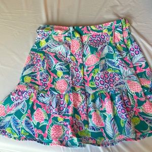 Lily Pulitzer print skirt with matching belt.